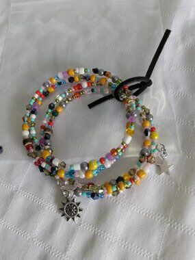 U - Handmade memory wire bracelets set with beads and pendants